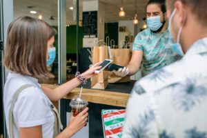 Buying coffee with a touchless transaction